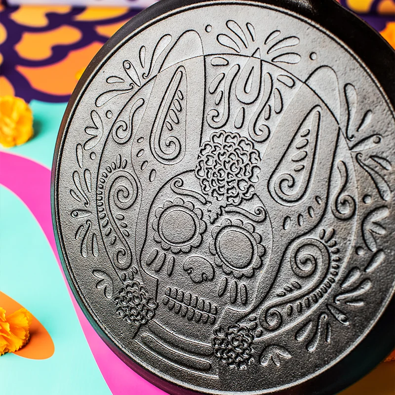 10.5 Inch Seasoned Cast Iron Xolo Sugar Skull Griddle with Deluxe Handle Holder - Image 4